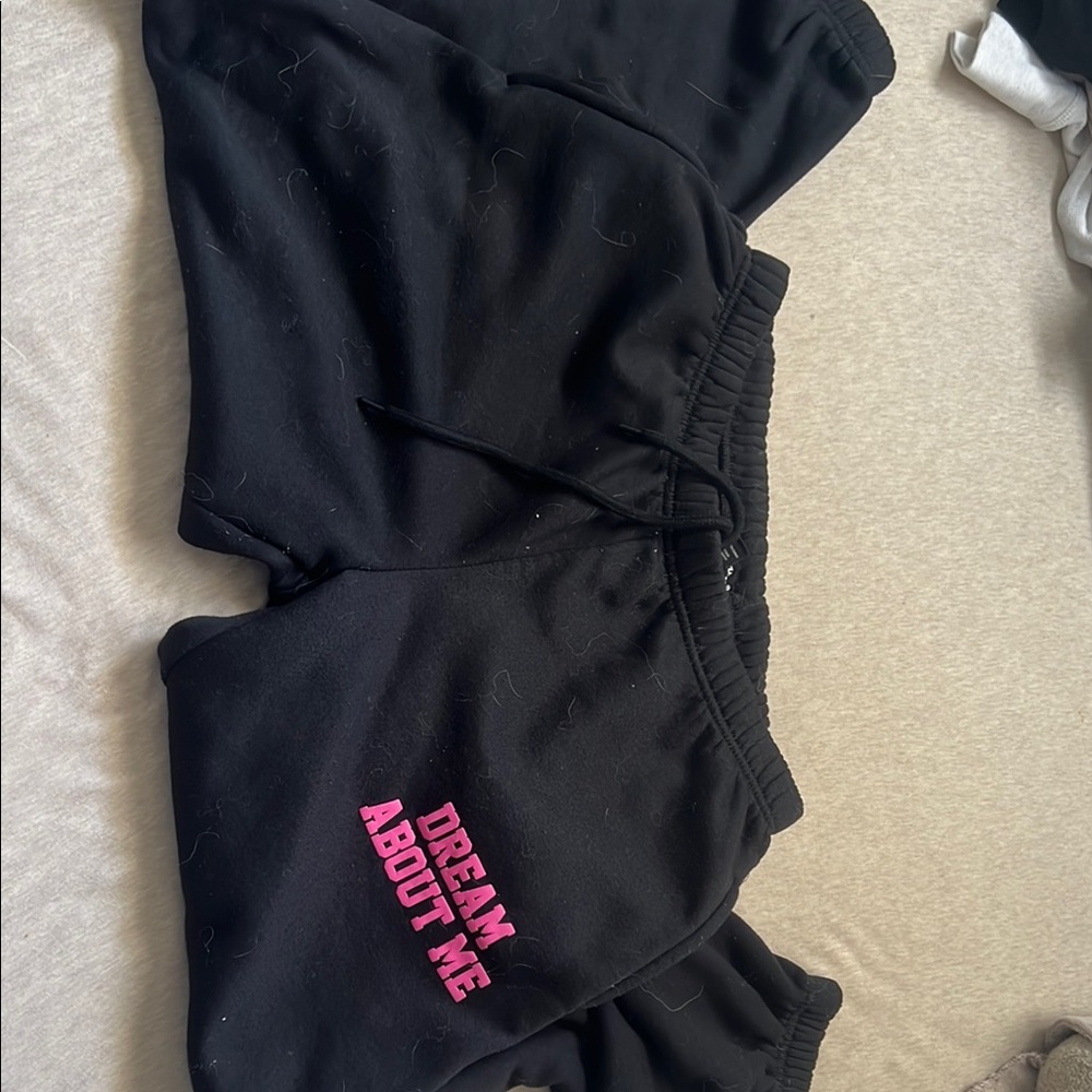 black and pink grafic sweat pants